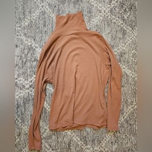 Tan ribbed turtleneck, size large